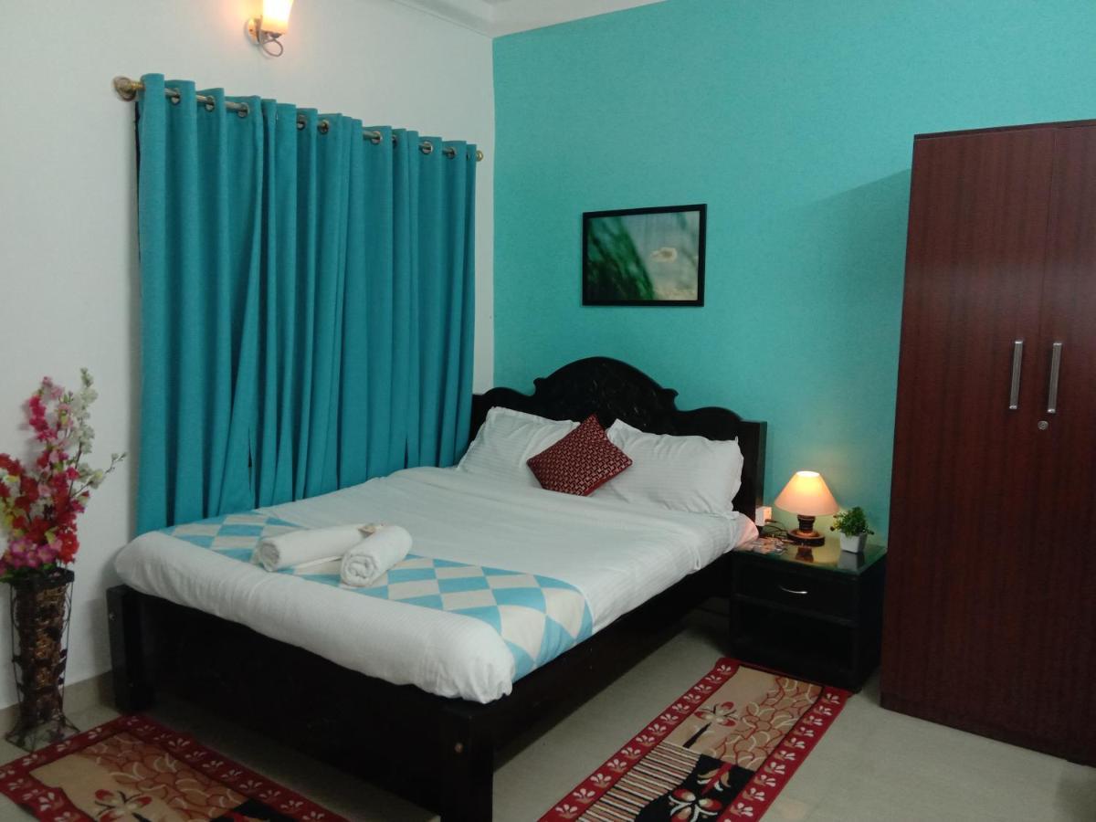 Coorg Homeland Homestay -With Kitchenette มาดิเครี ภายนอก รูปภาพ